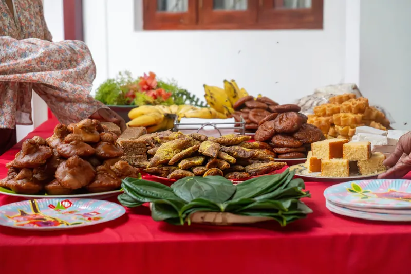 A festive table spread of Sri Lankan New Year sweets and bananas